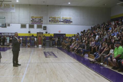 Columbia High School Principal Trey Hosford speaks to a packed gym full of incoming freshmen students and their parents during orientation on Monday. (TONY BRITT/Lake City Reporter)