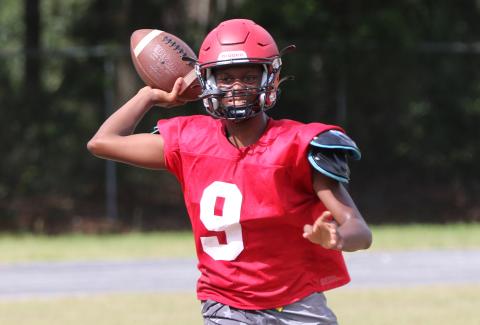 Lafayette quarterback Tywan Williamson throws a pass during practice on Aug. 3. (JAMIE WACHTER/Lake City Reporter)