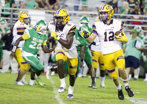 Columbia receiver Camdon Frier (12) rushes up the field as Jaylen Cooper runs to block during Friday’s Preseason Classic against Suwannee. (BRENT KUYKENDALL/Lake City Reporter)