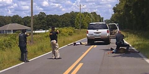 Columbia County Sheriffs hold a trio of suspects at gunpoint after their vehicle fled a traffic stop following a robbery at a Dollar General Tuesday afternoon. (COURTESY CCSO)