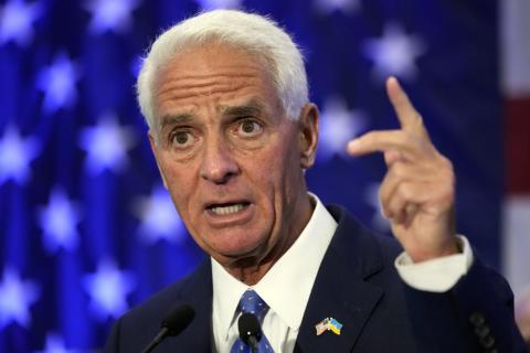 Rep Charlie Crist, D-Fla., gestures after declaring victory Tuesday in St. Petersburg. Crist defeated Agriculture Commissioner Nikki Fried in the Democratic gubernatorial primary election and will face incumbent Republican Gov. Ron DeSantis in November. (CHRIS O'MEARA/Associated Press)
