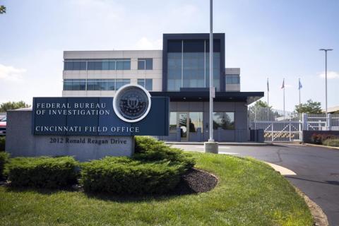 The entrance to the FBI headquarters in Cincinnati is shown. An armed man decked out in body armor tried to breach a security screening area at an FBI field office in Ohio on Thursday, then fled and exchanged gunfire in a standoff with law enforcement, authorities said. (LIZ DUFOUR/The Cincinnati Enquirer via AP)