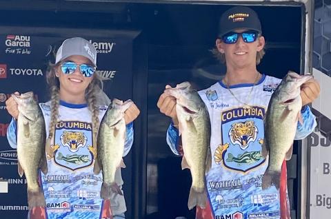 CHS Bassmasters Anna Swisher (left) and Ty Jackson (right) hold up their haul at the Abua Garcia Bassmaster High School National Championship. (COURTESY)