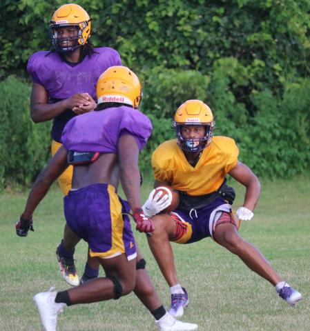 Columbia receiver Dailyn Bradley makes a move in the open field after catching a pass during Friday’s practice. (JORDAN KROEGER/Lake City Reporter)