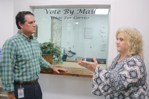 Columbia County Supervisor of Elections Tomi Brown (right) talks with Florida Secretary of State Cord Byrd Monday afternoon. (TONY BRITT/Lake City Reporter)