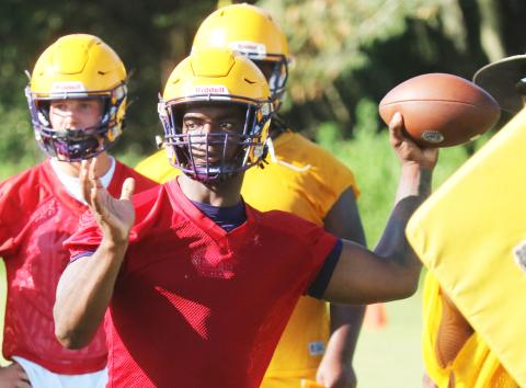 Columbia quarterback Tyler Jefferson throws a pass during Tuesday’s practice. (JORDAN KROEGER/Lake City Reporter)