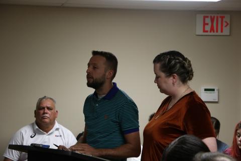 Garrett Morrison, left, and Destiny Evans discussed Remnant Ministries’ vision for the main Lake Shore Hospital building. (MORGAN MCMULLEN/Lake City Reporter)