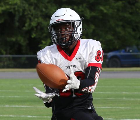 Fort White running back Kamarion Griffin catches a touchdown pass during Friday’s team scrimmage. (MORGAN MCMULLEN/Lake City Reporter)
