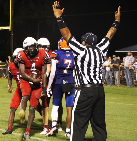 Fort White fullback Maliki Clark celebrates after scoring a touchdown against Branford during Friday's Preseason Classic. (MORGAN MCMULLEN/Lake City Reporter)