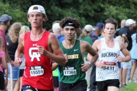 Suwannee’s Morgan Mobley (right) runs during the Cecil Field Summer Classic on Friday. (COURTESY)