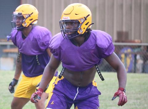 Columbia linebacker Tyrell Peterson gets set for a snap during practice on Aug. 11. (JORDAN KROEGER/Lake City Reporter)