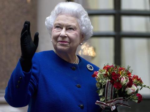Queen Elizabeth II, waving during an official visit as part of a Jubilee celebration in 2012, died Thursday at the age of 96. (ASSOCIATED PRESS)