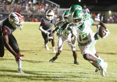 Suwannee defensive back PJ Davis scores on a pick-6 in the third quarter Friday against North Marion. (PAUL BUCHANAN/Special to the Reporter)