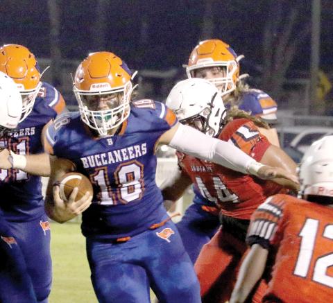 Branford quarterback Cohen David looks for room to run against Fort White in a Preseason Classic game Aug. 19. (MORGAN MCMULLEN/Lake City Reporter)