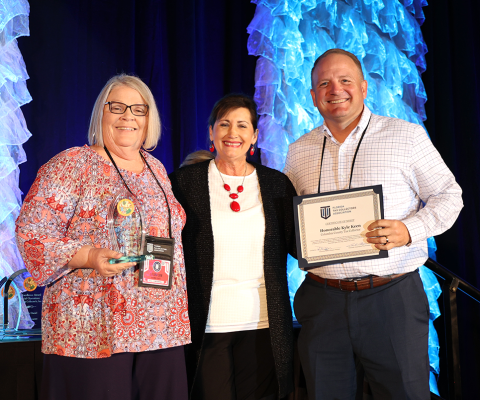 The Columbia County Tax Collector’s office was honored with a 2022 legacy finance award by the Florida Tax Collector’s Association. The award is earned for outstanding finance operations and clean annual audit reports. La Gina Dow, (left) Columbia County Tax Collector Finance Director, and Columbia County Tax Collector Kyle Keen (right) accepted the honors from Florida Tax Collector’s Association President Rhonda Skipper during a recent state event. (COURTESY)