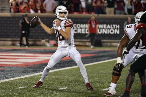 Florida State quarterback Tate Rodemaker (18) looks for a receiver during Friday’s game against Louisville. (TIMOTHY D. EASLEY/Associated Press)