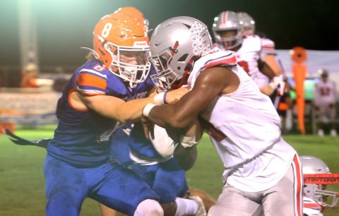 Branford linebacker Trevor Maddox goes in for a tackle against Williston last Friday. (PAUL BUCHANAN/Special to the Reporter)
