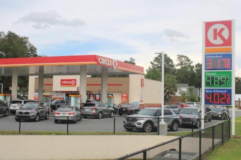 A line of cars wait to fill up at the Circle K gas station at the  intersection of U.S. Highway 90 and Baya Drive Thursday. (TONY BRITT/Lake City Reporter)