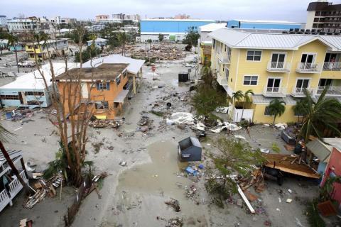 Damaged homes and businesses are seen in Fort Myers Beach on Thursday following Hurricane Ian. (DOUGLAS R. CLIFFORD/Tampa Bay Times via AP)