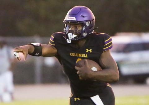 Columbia quarterback Tyler Jefferson scrambles up the field against Madison County last Friday. (BRENT KUYKENDALL/Lake City Reporter)