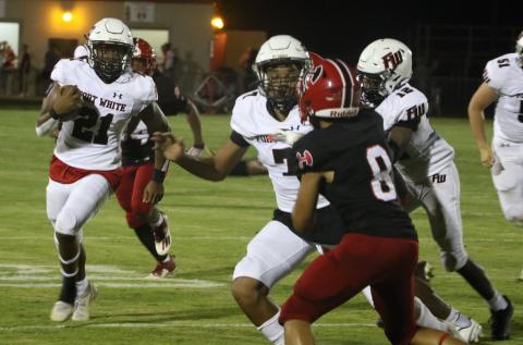 Fort White running back Kamarion Griffin rushes up the field against Hamilton County last Friday. (MORGAN MCMULLEN/Lake City Reporter)