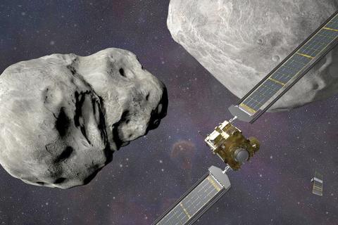 This illustration depicts NASA’s DART probe, foreground right, at the Didymos system before impact with the asteroid Dimorphos, left. (STEVE GRIBBEN/Johns Hopkins APL/NASA via AP)