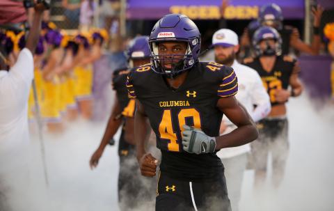 Columbia linebacker Seth Stockton runs onto the field prior to a game against Madison County on Sept. 16. (BRENT KUYKENDALL/Lake City Reporter)