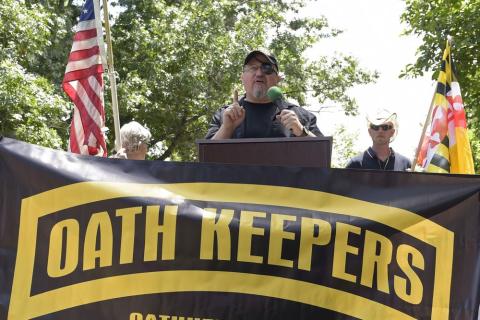 Stewart Rhodes, founder of the Oath Keepers, center, speaks during a rally outside the White House in Washington, June 25, 2017. The trial of the founder of the Oath Keepers and four associates charged with seditious conspiracy in the attack on the U.S. Capitol is set to begin next week. (SUSAN WALSH/AP File)