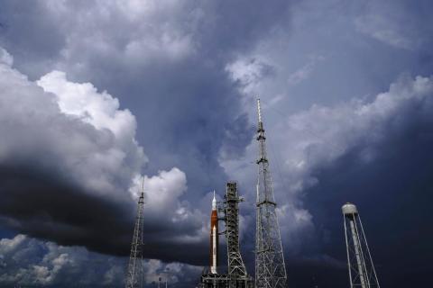 The NASA moon rocket stands on Pad 39B before a launch attempt for the Artemis 1 mission to orbit the moon at the Kennedy Space Center on Sept. 2, 2022, in Cape Canaveral, Fla. NASA mission managers decided Monday, Sept. 26, 2022, to move its moon rocket off the launch pad and into shelter due to Hurricane Ian's uncertain path. (Brynn Anderson/AP File)