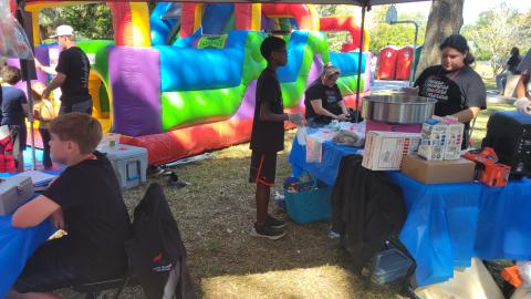 Lafayette FBLA members sold cotton candy as well as face painting and operated an inflatable obstacle course at Pioneer Day to raise funds for a trip to the National Fall Leadership Conference. (COURTESY)