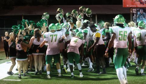 Suwannee’s football team celebrates after defeating Wakulla 22-14 to win the District 4-2S title on Friday. (PAUL BUCHANAN/Special to the Reporter)