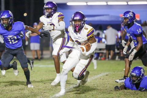 Columbia receiver Tray Tolliver (6) returns a kick against Trinity Christian on Sept. 23. (BRENT KUYKENDALL/Lake City Reporter)