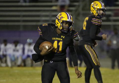 Columbia running back Zamarion Jones rushes up the field against Gadsden County on Oct. 21. (BRENT KUYKENDALL/Lake City Reporter)