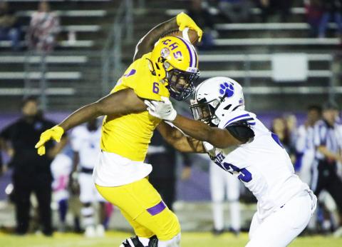 Columbia receiver Tray Tolliver makes a move on a Ridgeview defender after a catch on Friday. (BRENT KUYKENDALL/Lake City Reporter)