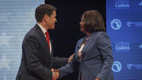 U.S. Sen. Marco Rubio and U.S. Rep. Val Demings greet each other before a televised debate on Tuesday. (THOMAS CORDY/Palm Beach Post via AP)