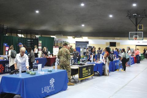 Booths get set up during Florida Gateway College’s career fair back in April. (FILE)