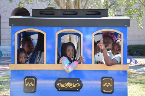 A family rides one of the trains at Florida Gateway College’s Fun in the Park event on Saturday. (COURTESY)