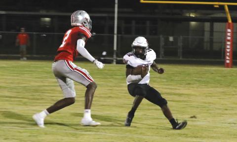Fort White running back Najeeb Smith makes a move in the open field against Williston on Sept. 23. (MORGAN MCMULLEN/Lake City Reporter)