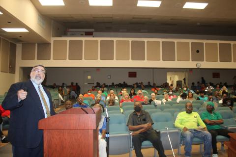 Columbia County Manager David Kraus goes through a Powerpoint presentation at Tuesday’s Board of County Commissioners meeting. (TONY BRITT/Lake City Reporter)