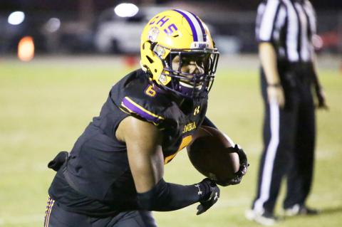 Columbia receiver Tray Tolliver runs after a catch against Gadsden County last Friday. (BRENT KUYKENDALL/Lake City Reporter)