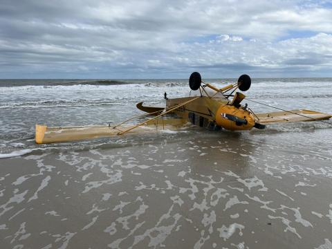 A plane overturned along the shore at Anastasia State Park on Monday when a Lake City pilot made an emergency landing due to engine failure. (COURTESY ST. AUGUSTINE POLICE DEPARTMENT)