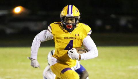 Columbia receiver Dailyn Bradley runs up the field after a catch against Ridgeview on Oct. 28. (BRENT KUYKENDALL/Lake City Reporter)
