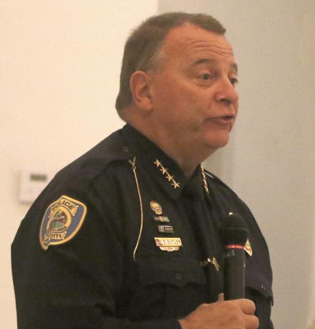 Lake City Police Chief Gerald Butler talks to residents during Tuesday evening’s ‘Breakfast with the Chief’ event at Southside Baptist Church. (MORGAN MCMULLEN/Lake City Reporter)
