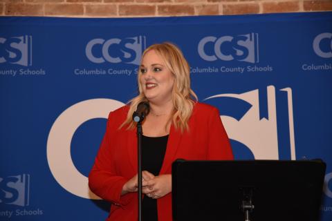 Dianna Swisher, the director of the Columbia County Public Schools Foundation, speaks at a previous year’s Teacher of the Year banquet. (FILE)
