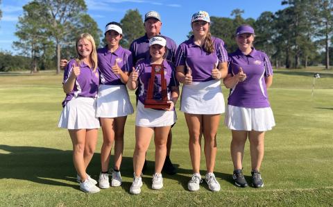 Columbia’s girls golf team finished runner-up at the Region 1-2A tournament on Tuesday. FRONT ROW: Veona Osborne (from left), Alison O’Brien, Karlee Gainey, Ashley Nelson and Megan Ruwe. BACK ROW: Head coach Chet Carter. (COURTESY)