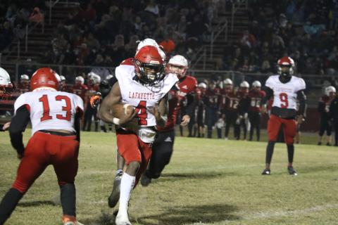 Lafayette running back Kiami McKnight scored on a 20-yard touchdown to give the Hornets the lead Friday. (MORGAN MCMULLEN/Lake City Reporter)