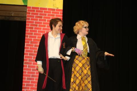 Apollo Davison (from left) and Ash Esposito practice their lines in a dress rehearsal for the production of ‘Puffs’ at Columbia High School. There are three performances scheduled for the weekend. (TONY BRITT/Lake City Reporter)