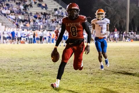 Lafayette running back JT Cook scores a touchdown against Branford during last Friday’s Region 3-1R quarterfinals. (JACK HOWDESHELL/Special to the Reporter)