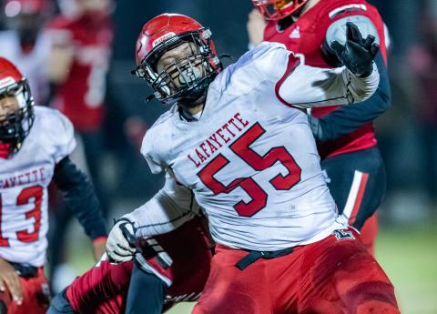 Lafayette defensive lineman Emanuel Watkins celebrates after a tackle against Hilliard during the Region 3-1R semifinals on Friday. (JACK HOWDESHELL/Special to the Reporter)