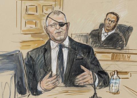 This artist sketch depicts the trial of Oath Keepers leader Stewart Rhodes, left, as he testifies before U.S. District Judge Amit Mehta on charges of seditious conspiracy on Nov. 7. (DANA VERKOUTEREN/Associated Press)